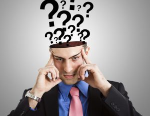 Portrait of a thoughtful man having doubts
